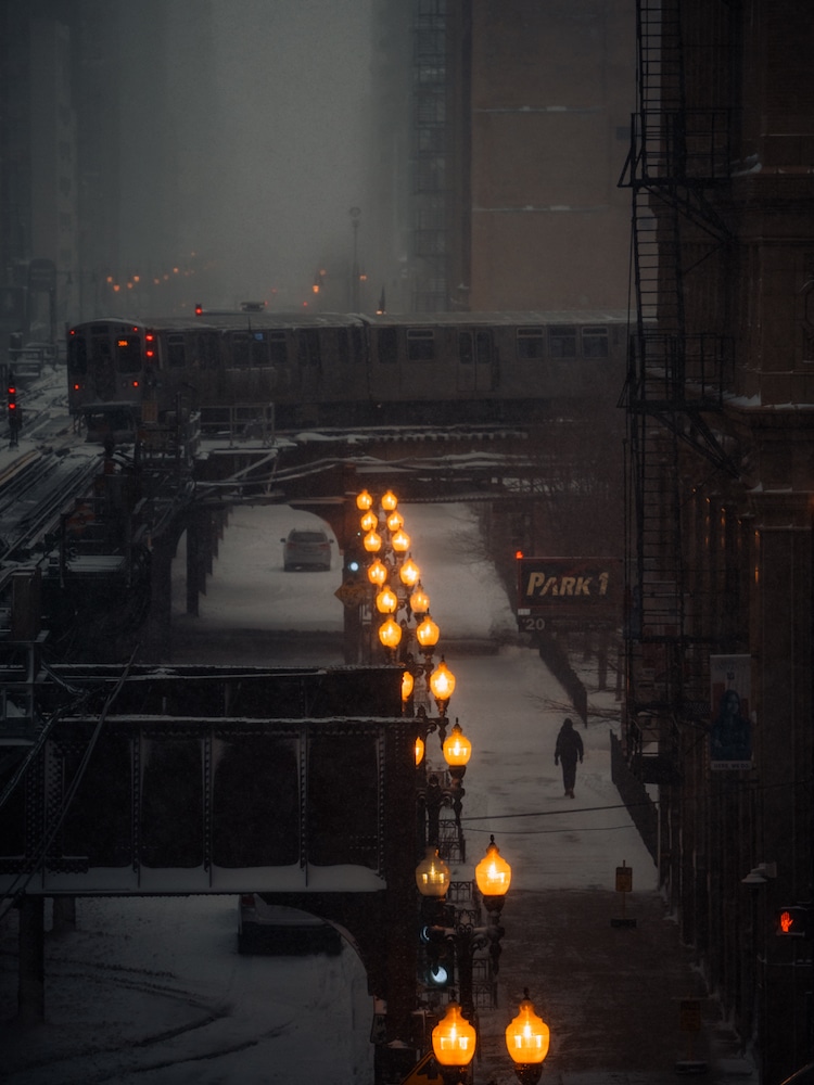 Trains in Chicago at Night by Nicolas Miller