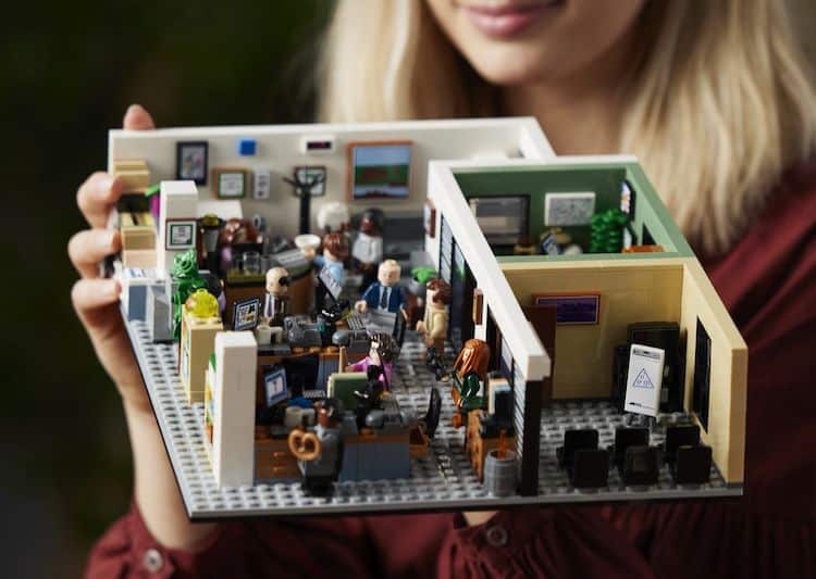 The Office Lego Set held in someone's hand