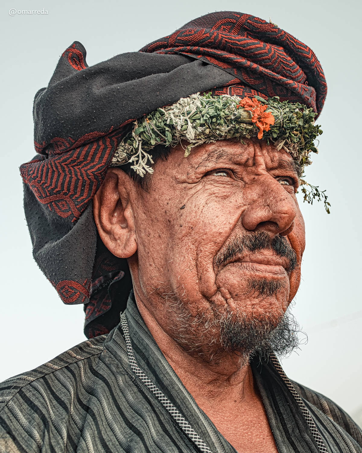 Older Saudi Flower Man Wearing a Crown